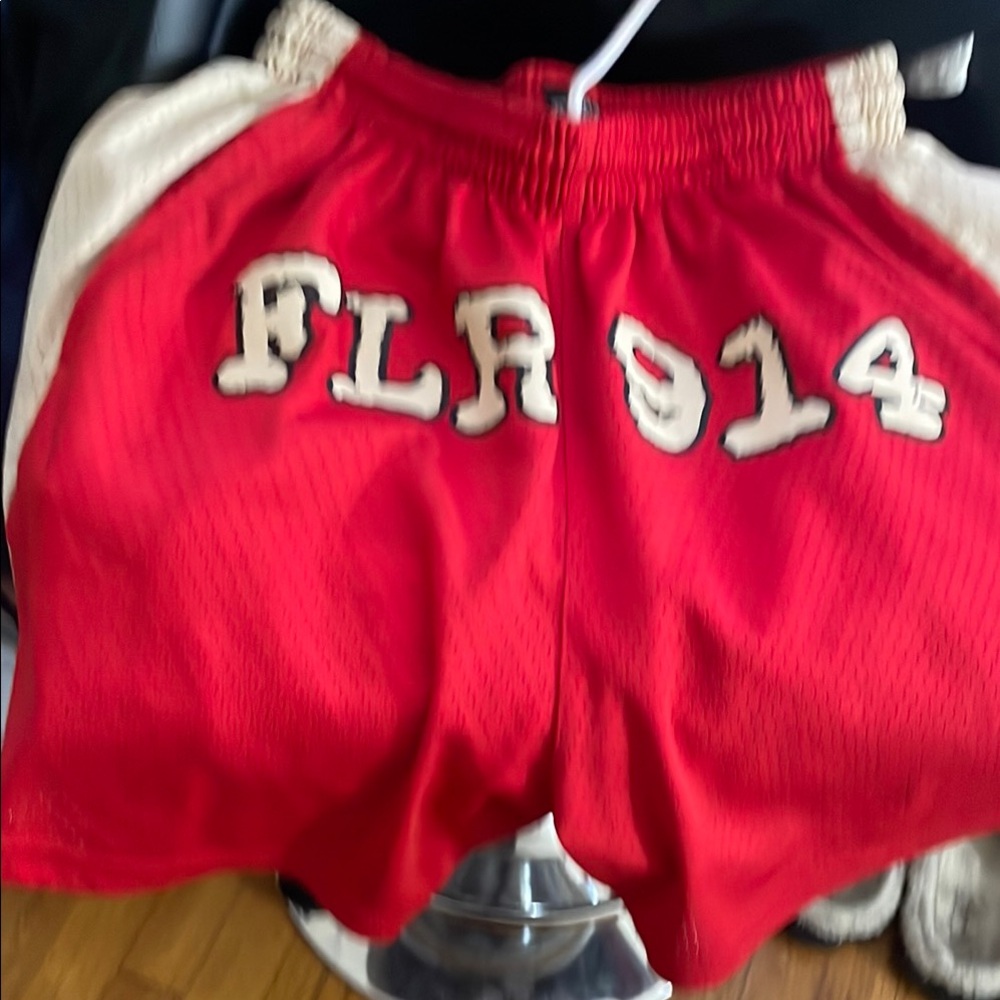 Red Athletic Shorts with White Lettering